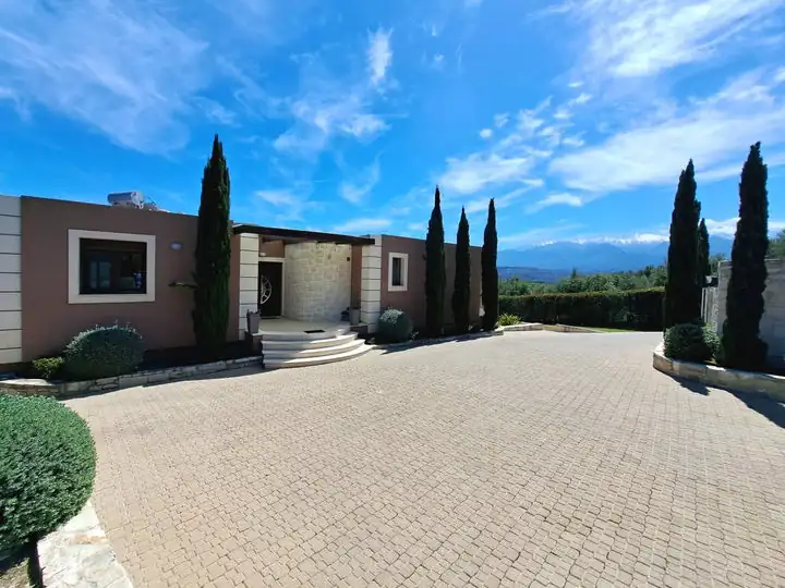Villa and cypress trees in Kalyves